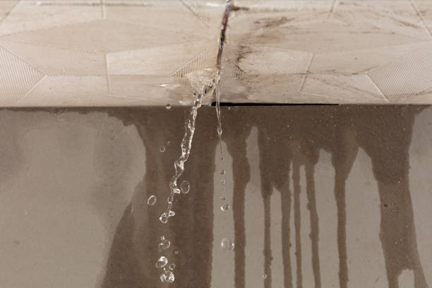 Professional Flood Damage Cleanup technician working in Groton, MA